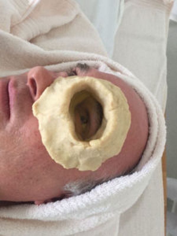 A ring of dough with warm ghee come around the eyes